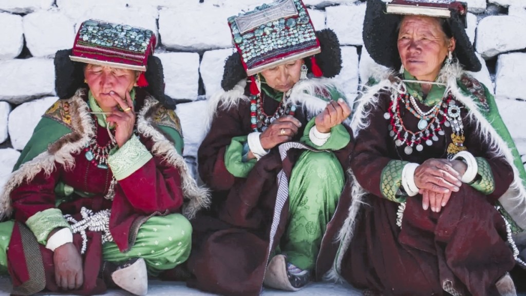 Ladakh Women in Traditional Costume with Coral Necklaces Ladakh Women in Traditional Costume with Coral Necklaces