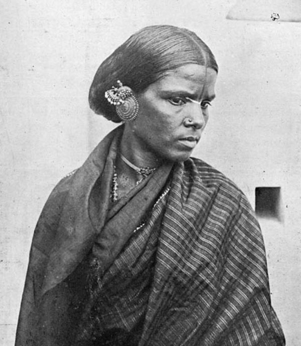 Indian Woman Wearing Earplug